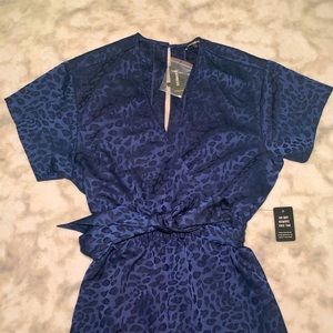 NWT Express blue animal print jump suit